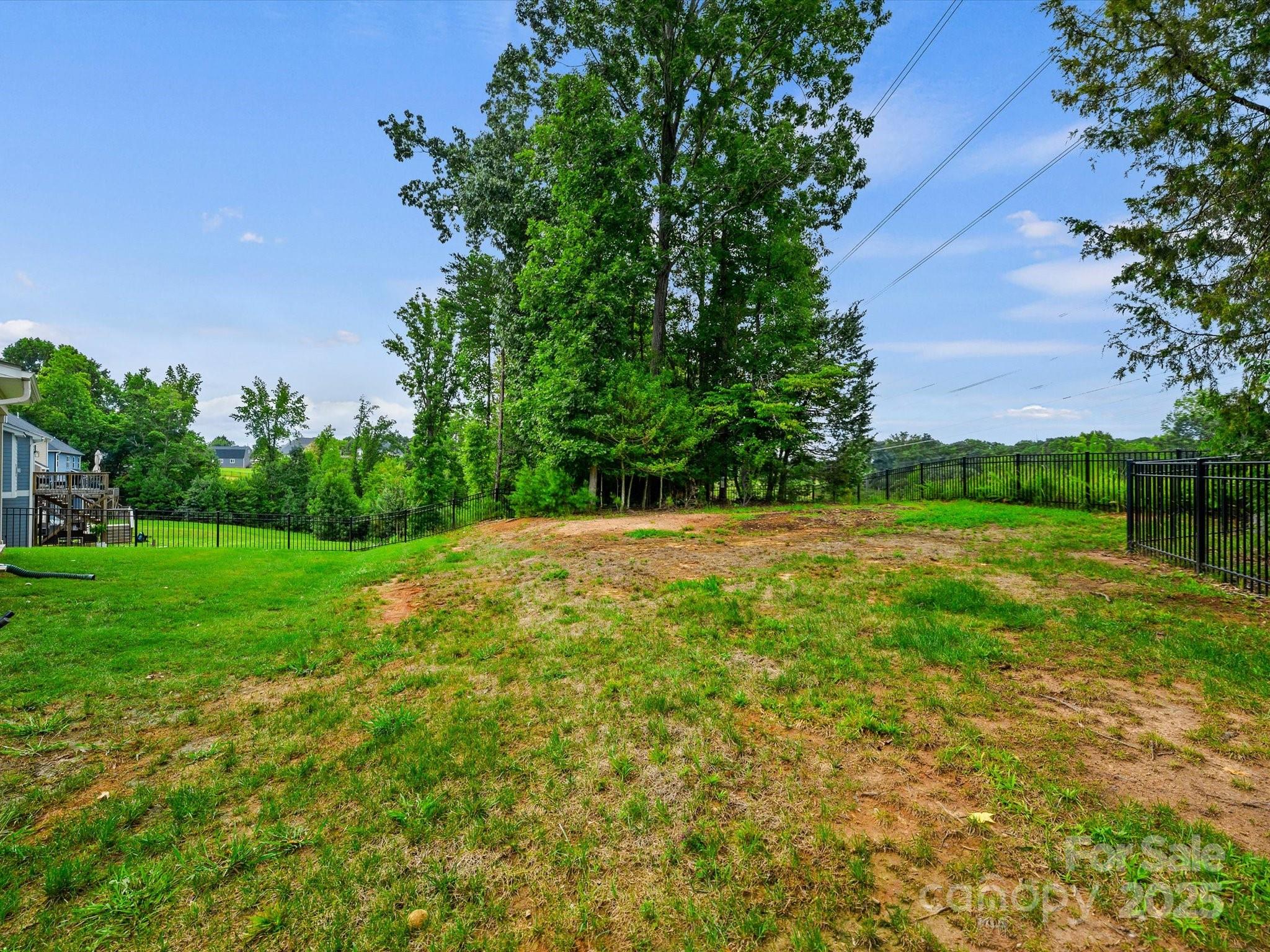 2901 South Point Road Belmont, NC 28012 - Photo 35 of 35 a view of a field of grass and trees