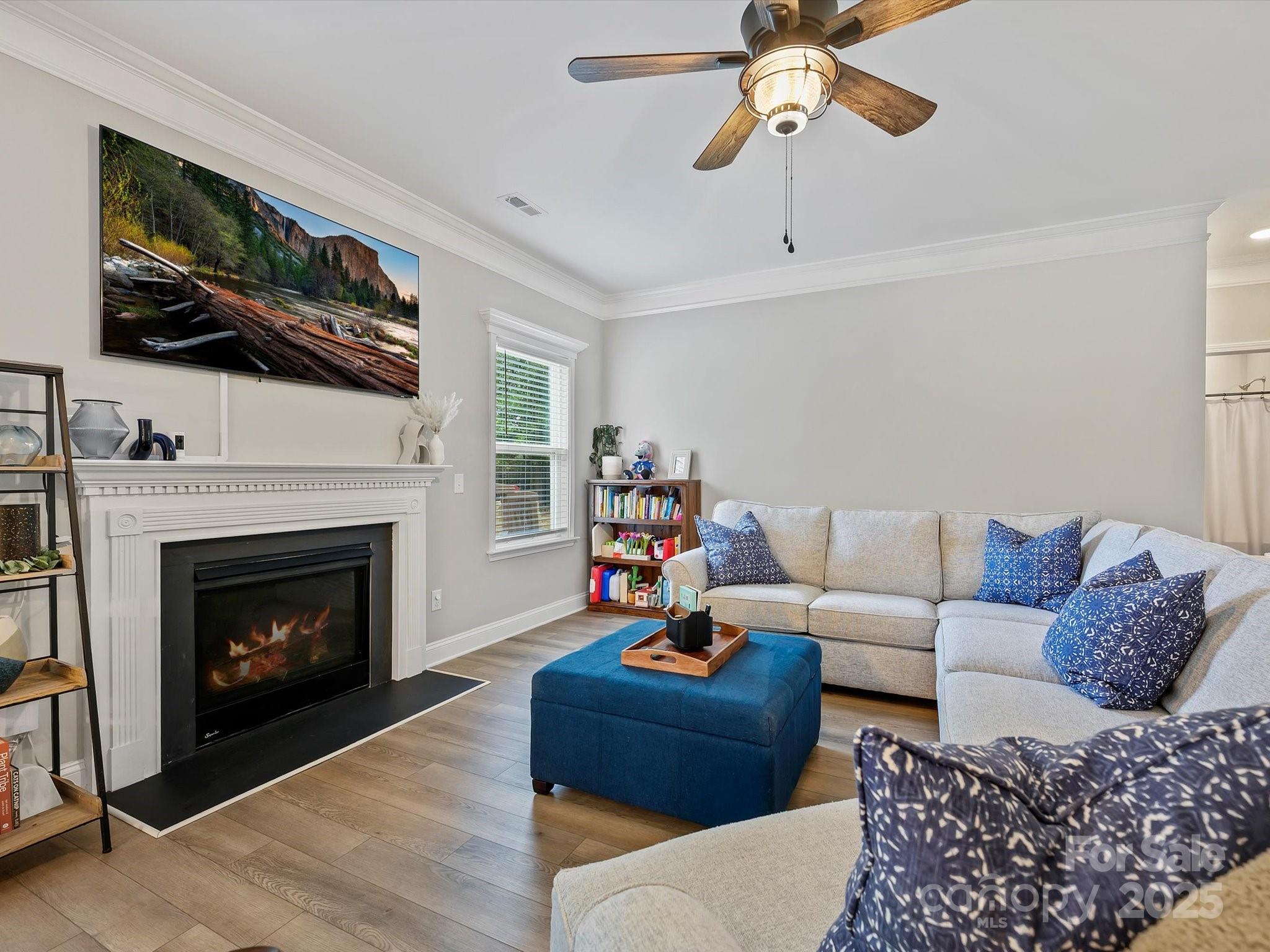 2901 South Point Road Belmont, NC 28012 - Photo 10 of 35 a living room with furniture and a fireplace