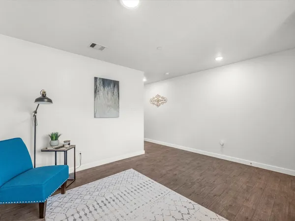 a bedroom with a bed and furniture