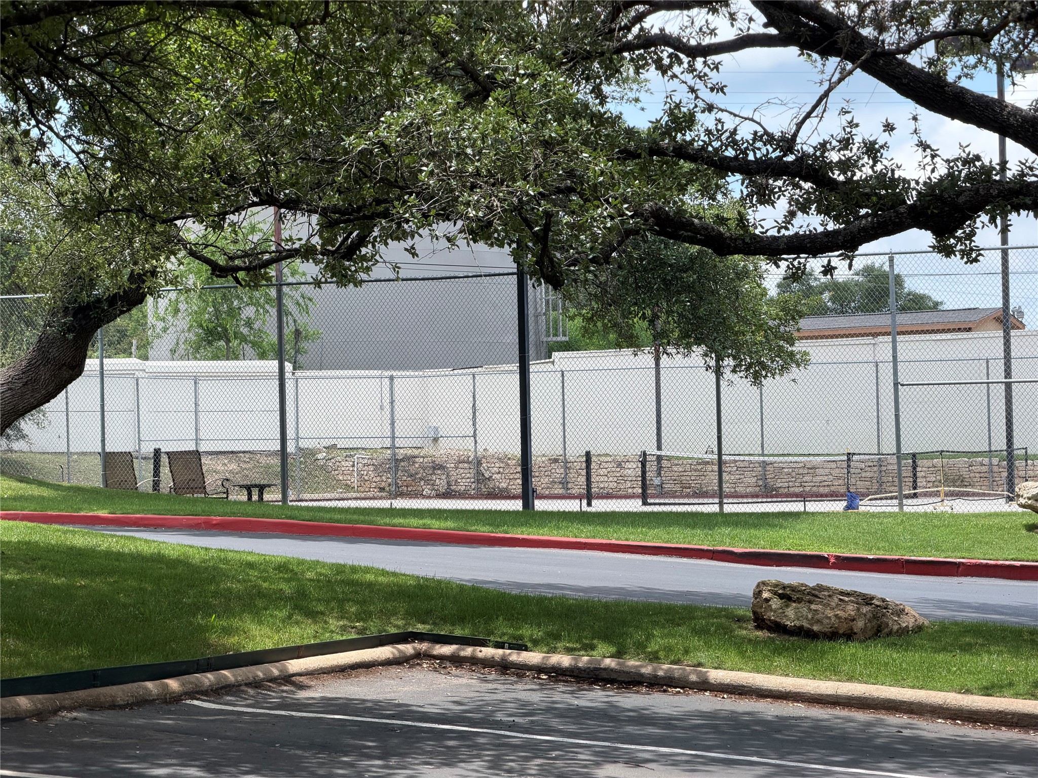 2918 Ranch Road 620 North, Unit C120 Austin, TX 78734 - Photo 25 of 34 The community tennis courts, perfect for active recreation and leisure.