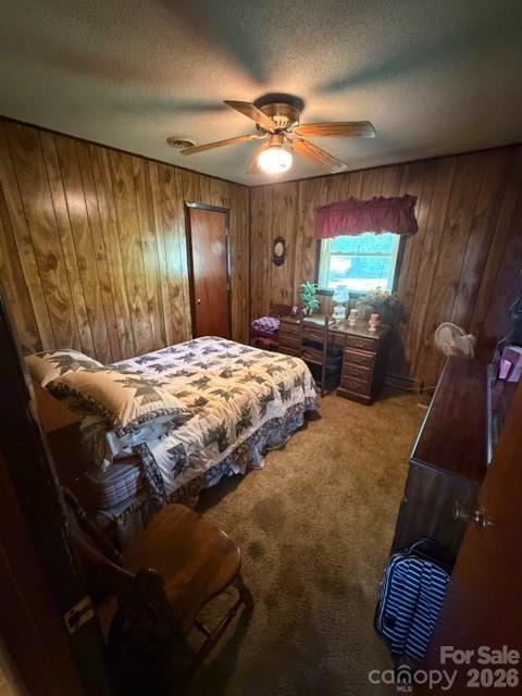 20415 Efird Road Albemarle, NC 28001 - Photo 12 of 16 a bedroom with a bed and a chandelier