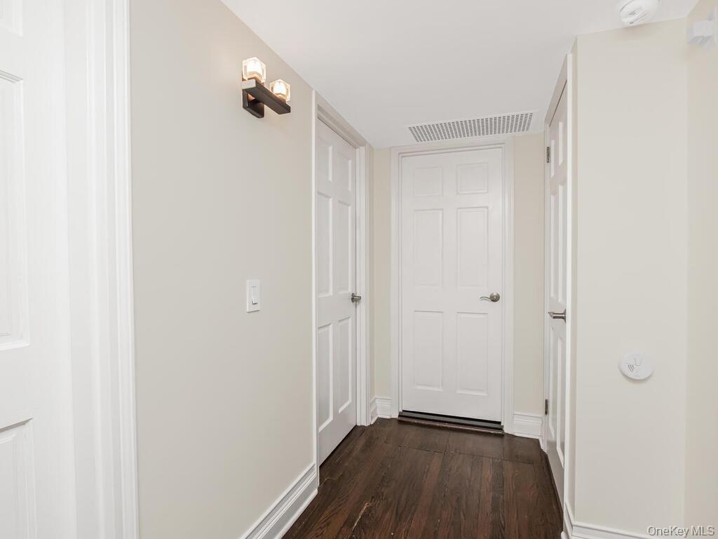 1332 Midland Avenue, Unit 3F Bronxville, NY 10708 - Photo 12 of 21 a view of a hallway with wooden floor