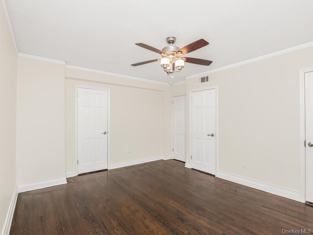 1332 Midland Avenue, Unit 3F Bronxville, NY 10708 - Photo 16 of 21 a view of an empty room with wooden floor