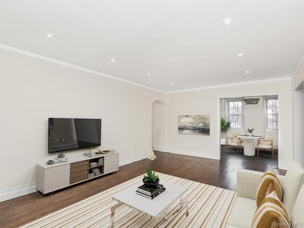 1332 Midland Avenue, Unit 3F Bronxville, NY 10708 - Photo 4 of 21 a living room with furniture and a flat screen tv