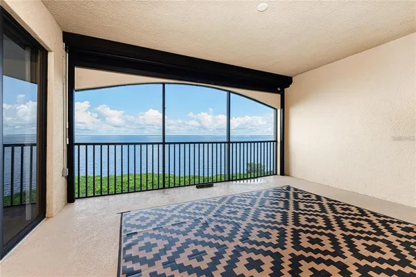 a bedroom with bed and window