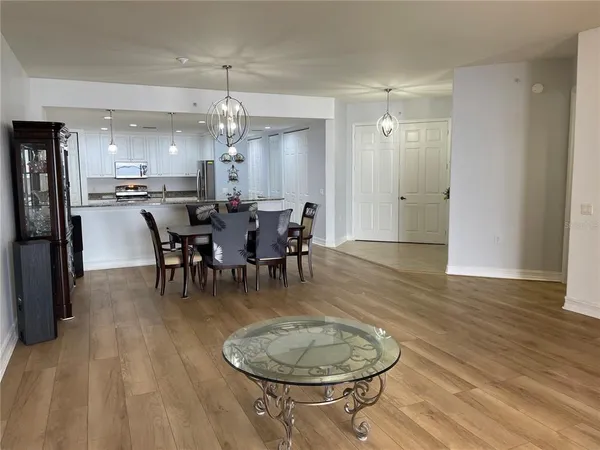 a view of walk in closet with empty room