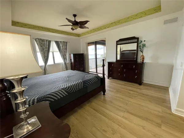 a view of a chairs and table in backyard