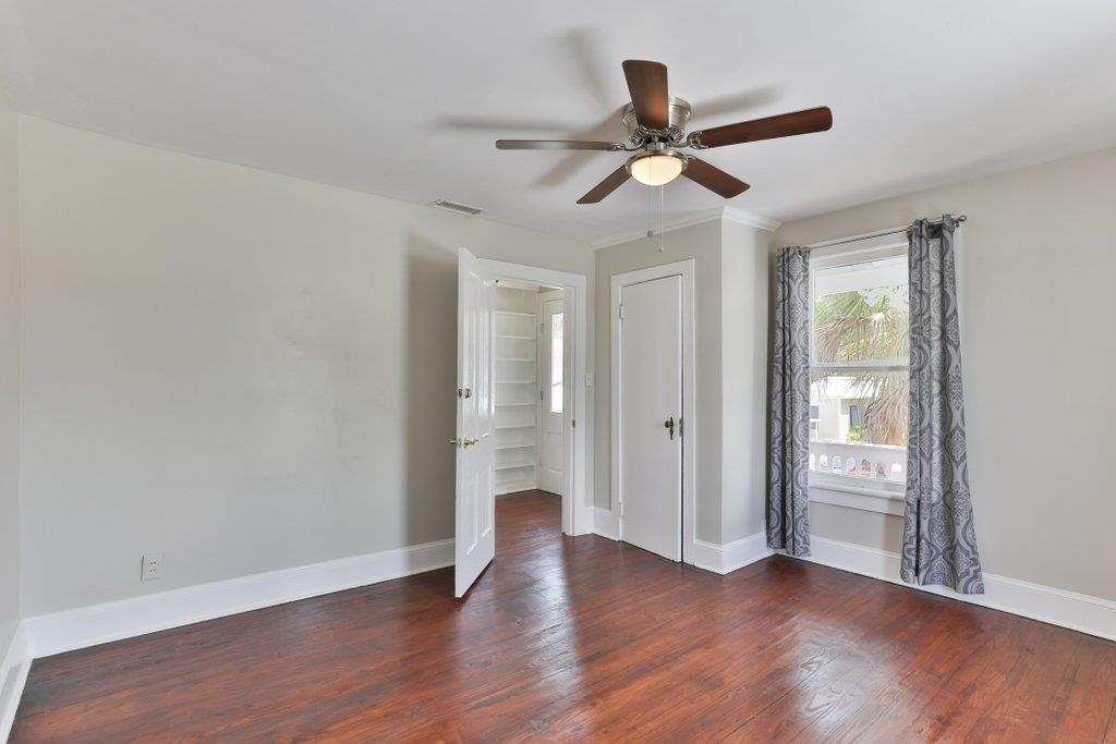 40 Abbott Street St. Augustine, FL 32084 - Photo 34 of 58 Unfurnished bedroom featuring dark wood-type flooring and ceiling fan