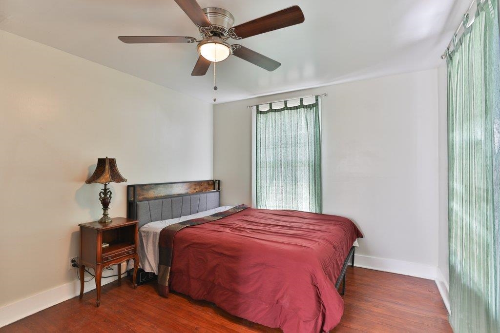 40 Abbott Street St. Augustine, FL 32084 - Photo 43 of 58 Bedroom featuring wood finished floors and ceiling fan