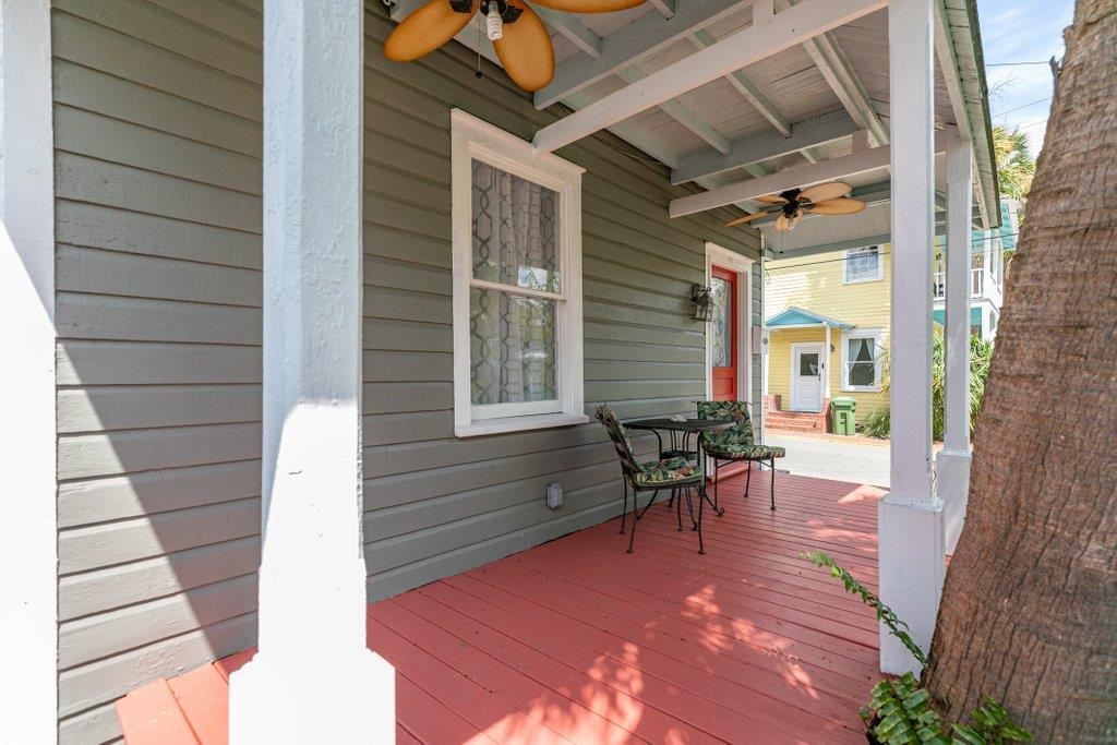 40 Abbott Street St. Augustine, FL 32084 - Photo 6 of 58 Wooden porch featuring ceiling fan