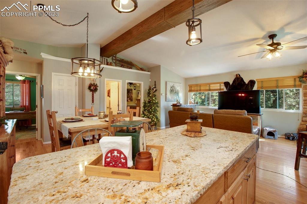290 North Mountain Estates Road Florissant, CO 80816 - Photo 21 of 32 a view of a dining room with furniture