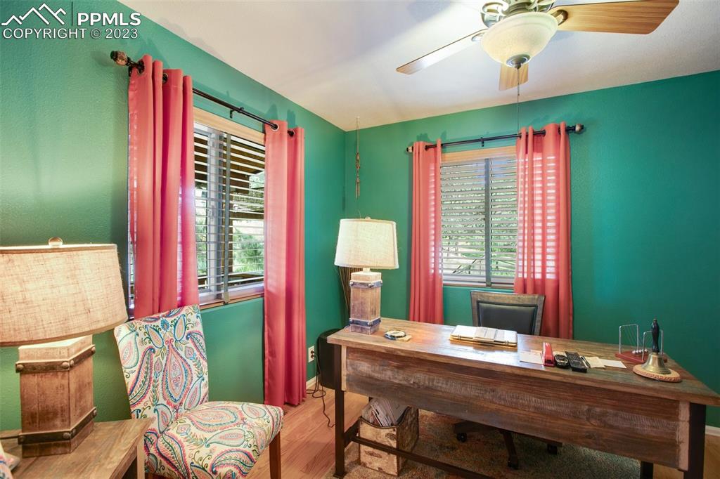 290 North Mountain Estates Road Florissant, CO 80816 - Photo 26 of 32 a workspace with furniture and a window