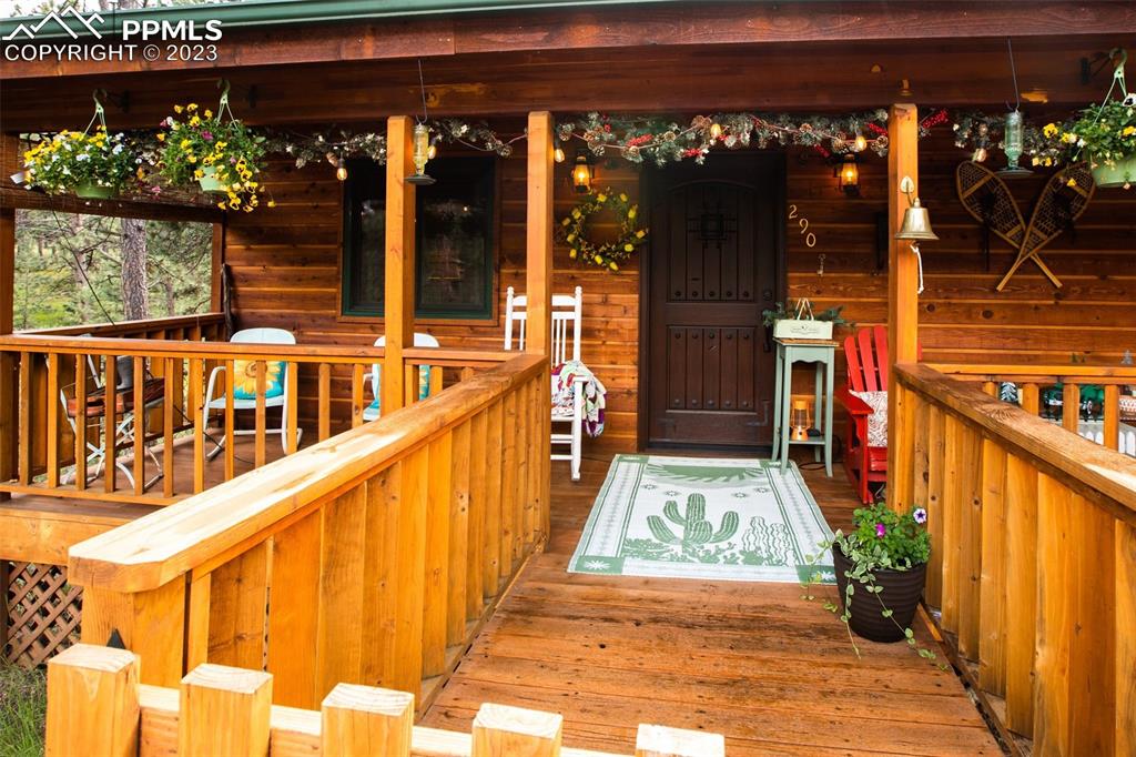 290 North Mountain Estates Road Florissant, CO 80816 - Photo 4 of 32 a view of swimming pool with a porch