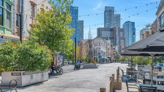 a view of a building with sitting area