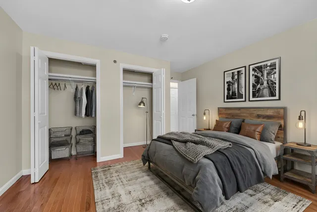 a bedroom with a bed and a view of bathroom