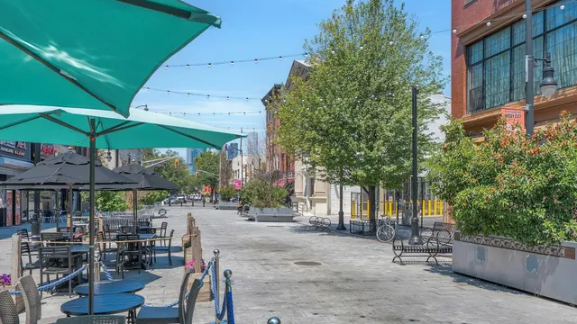 a view of street with sitting area