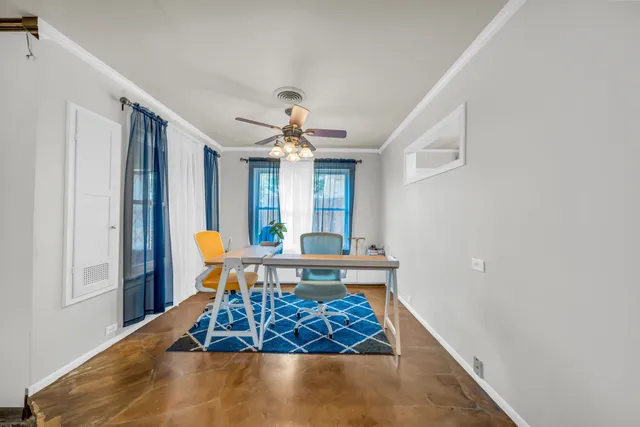 a view of a livingroom with furniture and window