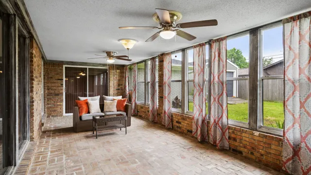 a view of a room with cars windows