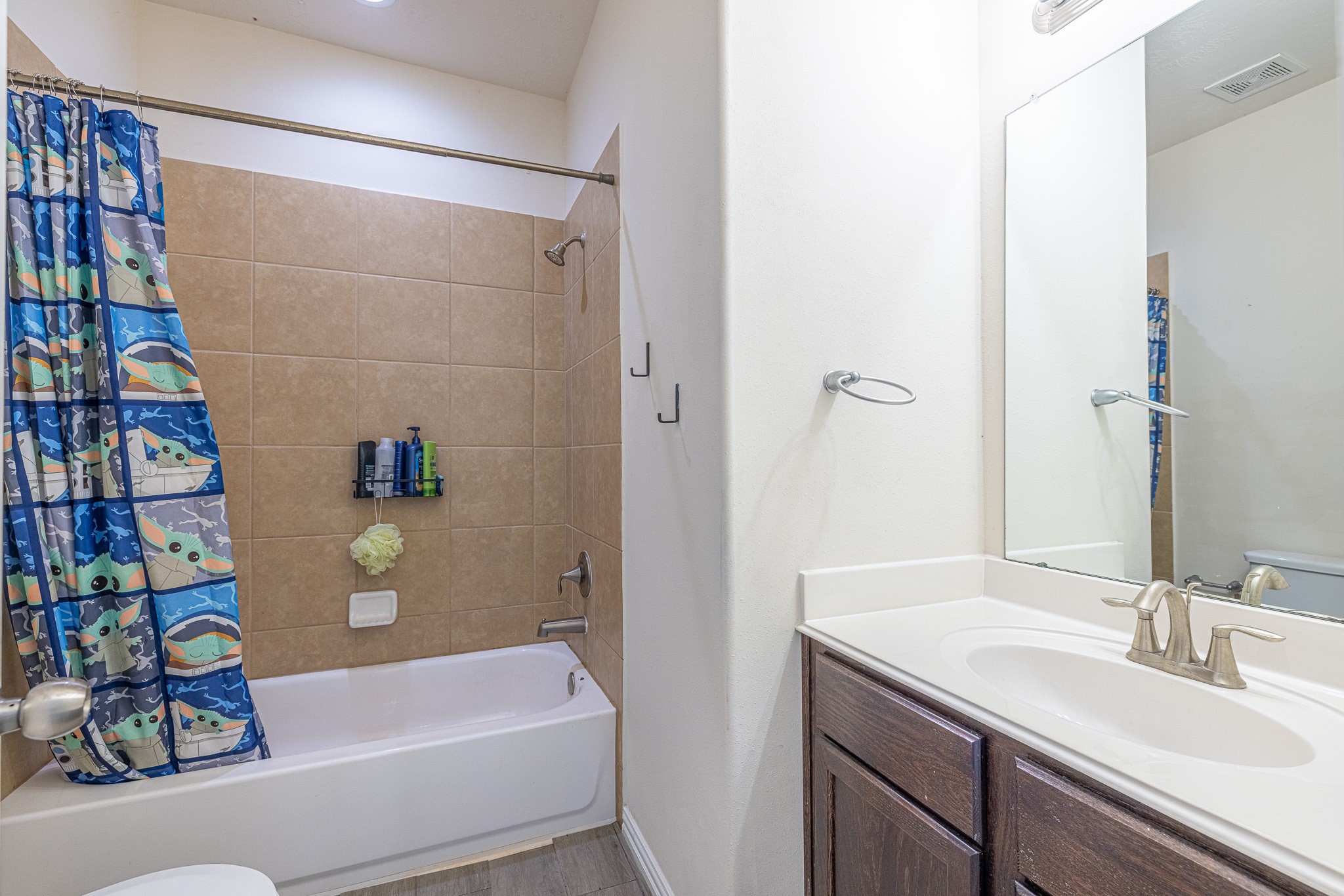 3818 Hunters Trail Baytown, TX 77521 - Photo 27 of 32 a bathroom with a bathtub and a sink