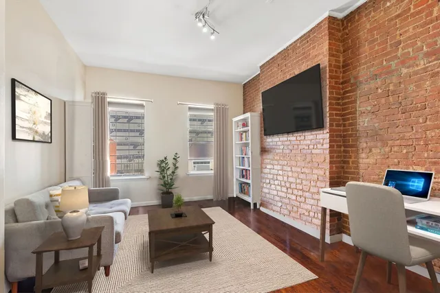 a picture of a room with a black and white wall