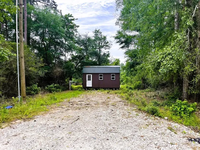 a view of a park and entertaining space