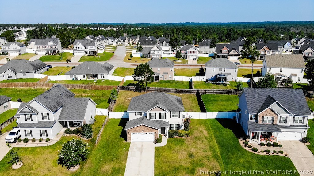 63 Colonist Place Cameron, NC 28326 - Photo 2 of 32 an aerial view of a house with a swimming pool yard and outdoor seating