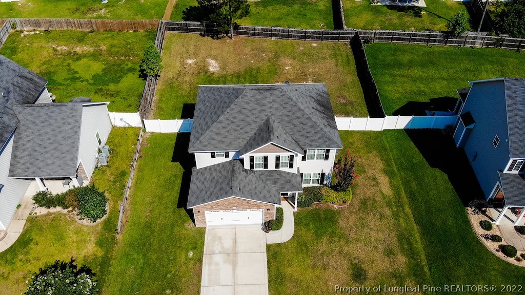 63 Colonist Place Cameron, NC 28326 - Photo 4 of 32 an aerial view of a house having swimming pool garden and patio