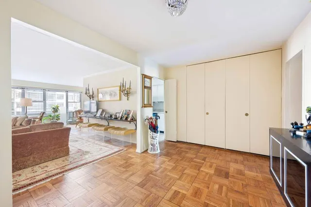 a view of a livingroom with furniture and windows