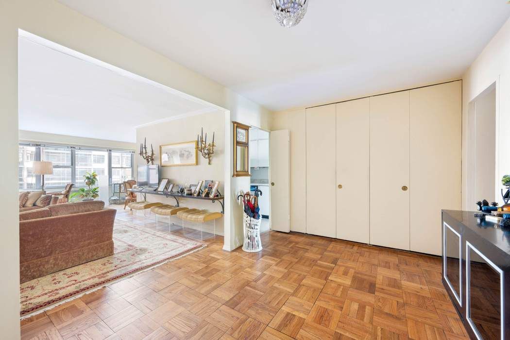a view of a livingroom with furniture and windows