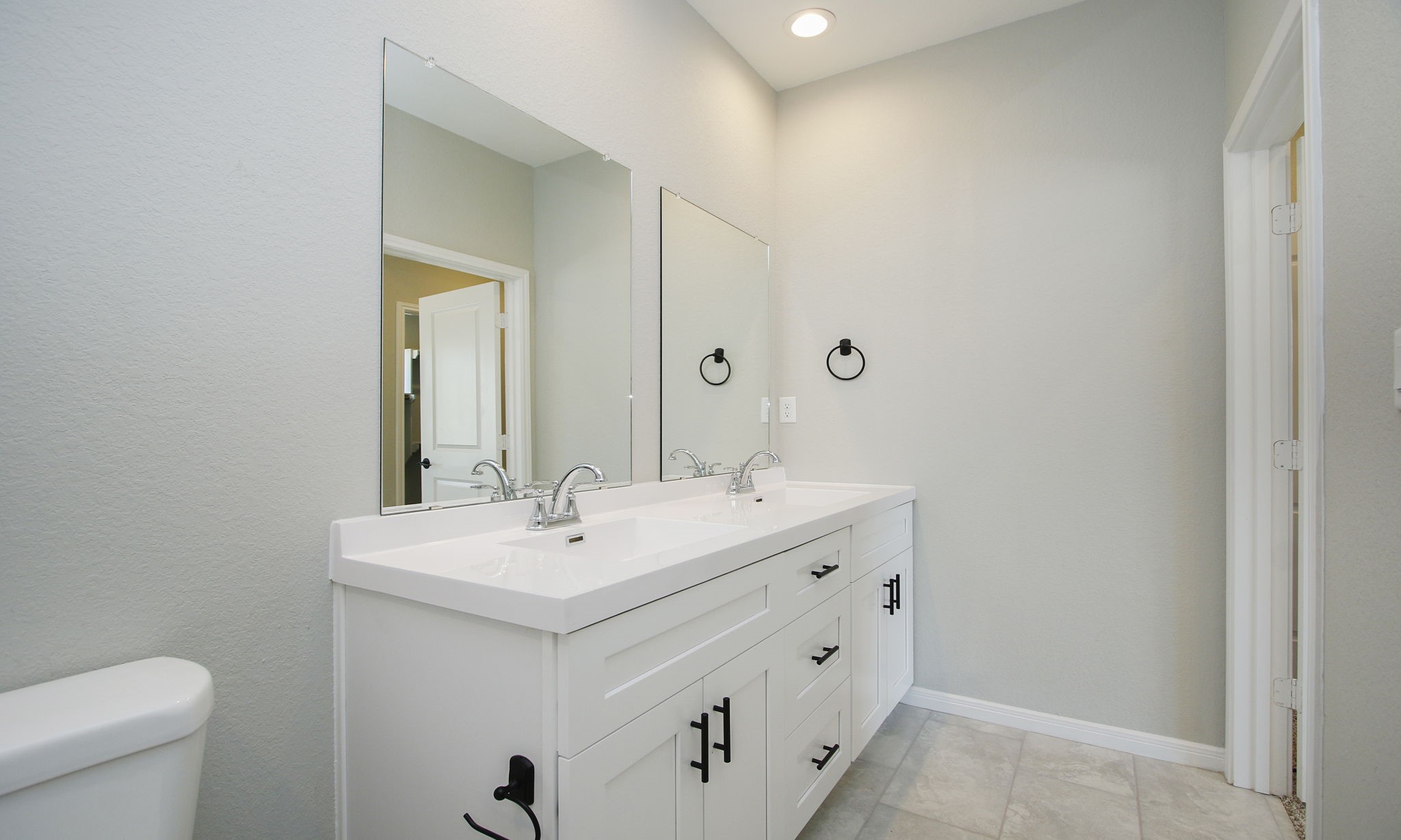 14010 Longstreet Road, Unit 9 Willis, TX 77318 - Photo 31 of 50 a bathroom with a sink and a toilet