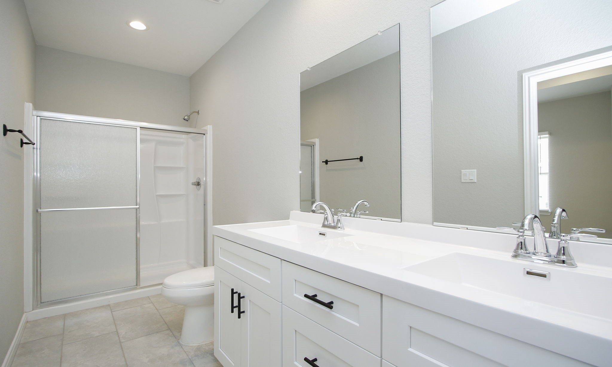 14010 Longstreet Road, Unit 9 Willis, TX 77318 - Photo 33 of 50 a bathroom with a sink a toilet and shower