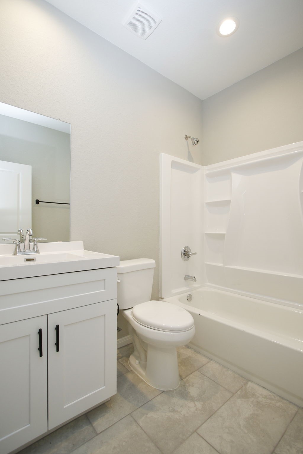 14010 Longstreet Road, Unit 9 Willis, TX 77318 - Photo 39 of 50 a bathroom with a sink a toilet and shower