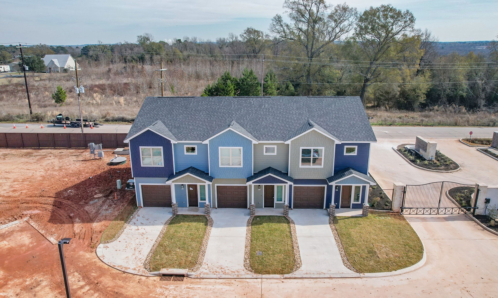 14010 Longstreet Road, Unit 9 Willis, TX 77318 - Photo 48 of 50 an aerial view of a house with swimming pool