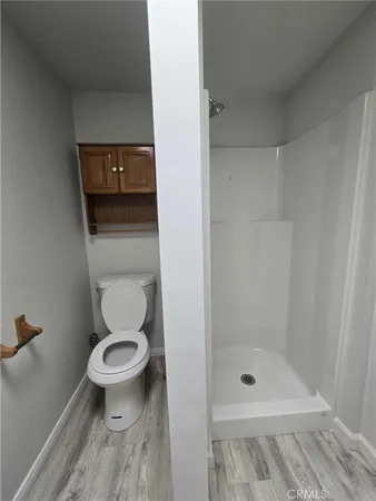 a view of a storage & utility room with a sink