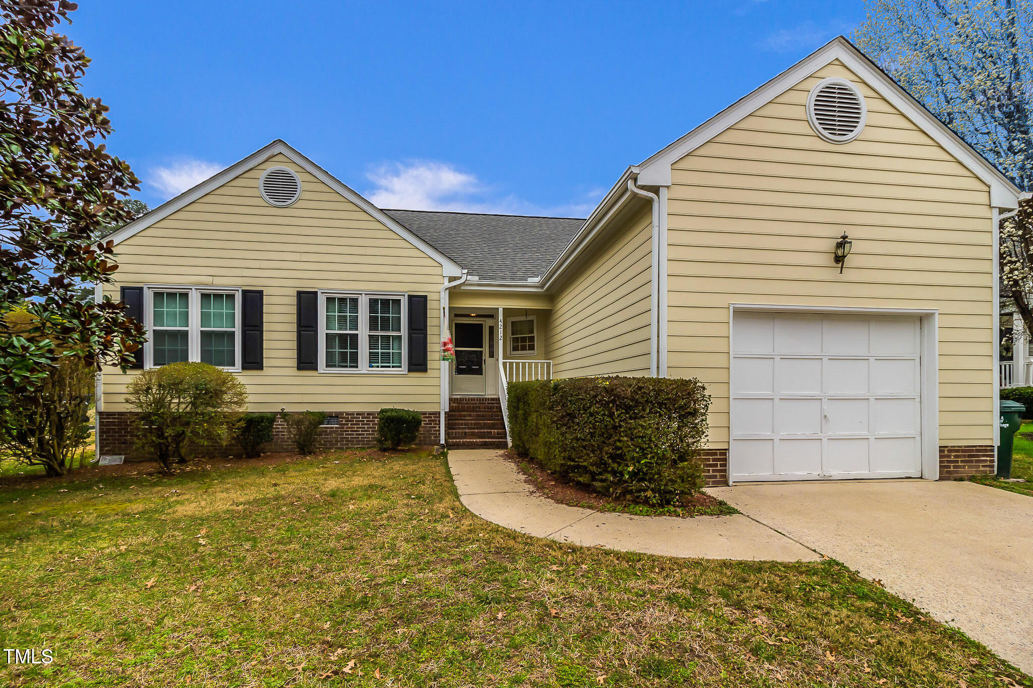 4212 Birmingham Way Raleigh, NC 27604 - Photo 3 of 17 a view of a house with a yard