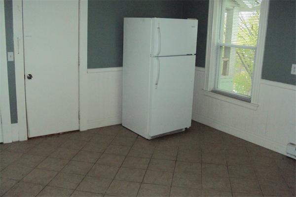 6 Beckman Street Worcester, MA 01607 - Photo 11 of 18 a view of a refrigerator in a kitchen