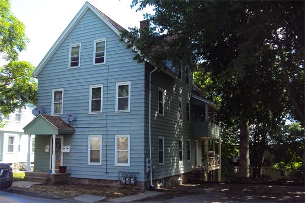 6 Beckman Street Worcester, MA 01607 - Photo 17 of 18 a front view of a house with a yard
