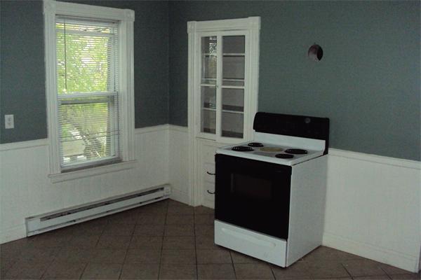 6 Beckman Street Worcester, MA 01607 - Photo 10 of 18 a view of an empty room with a window