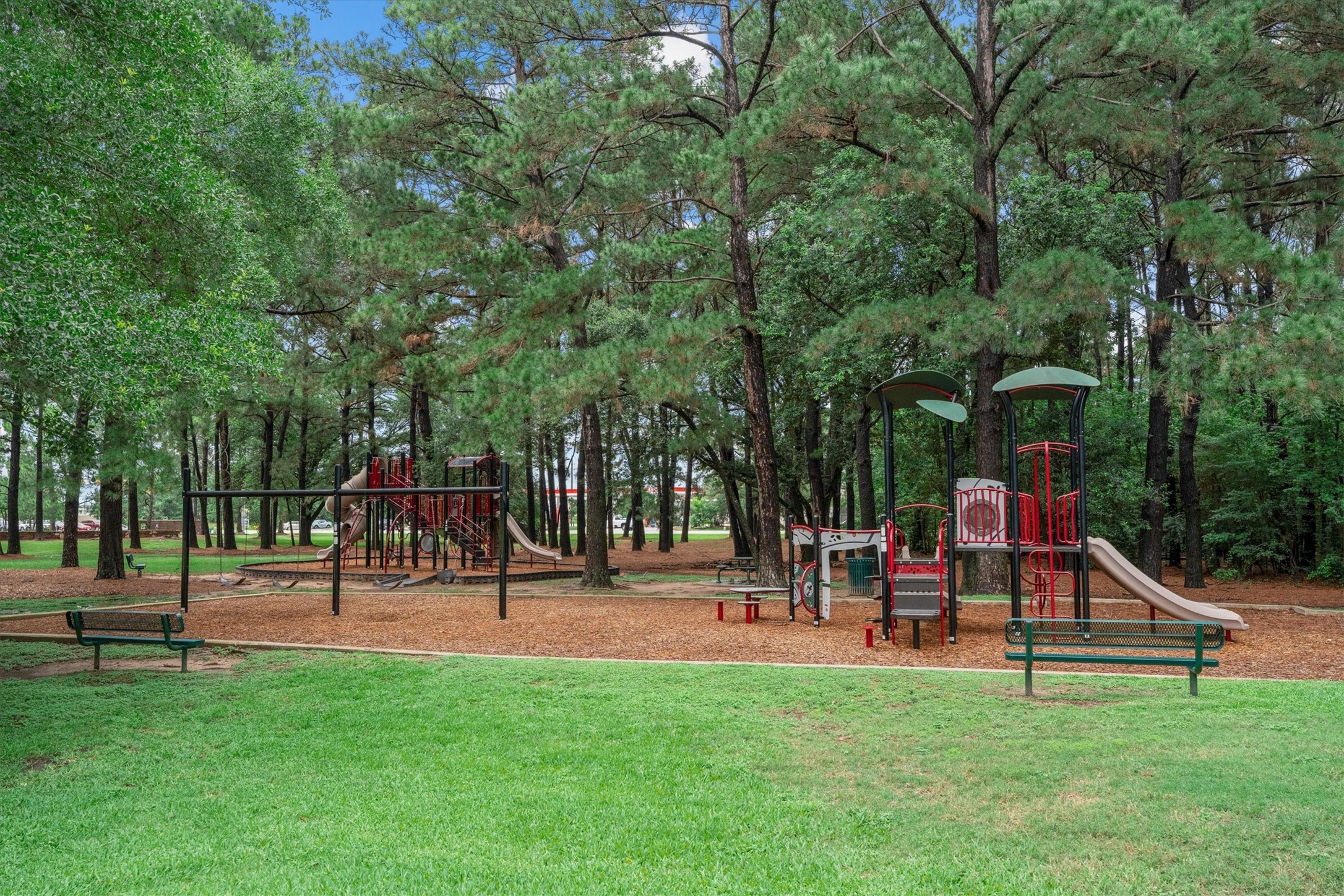 6323 Stone Trail Lane Spring, TX 77379 - Photo 40 of 43 a park with lots of swings and slides