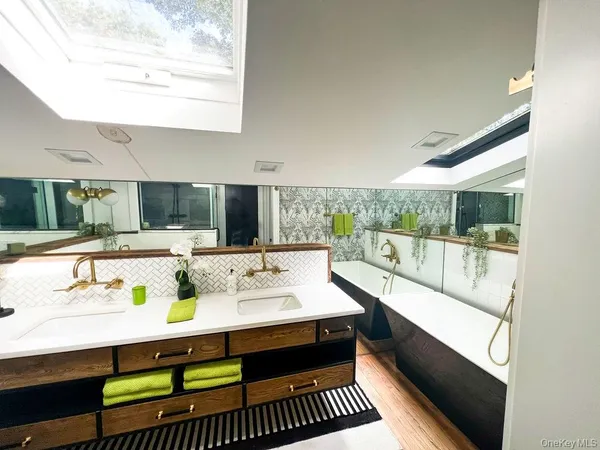 a bathroom with a sink and a bathtub