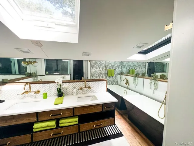 a bathroom with a sink and a bathtub
