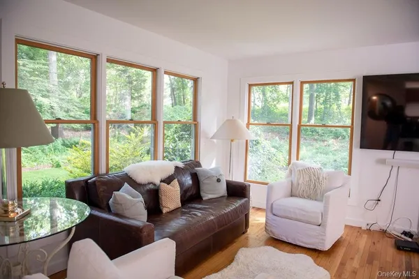 a kitchen with a table chairs stove and microwave