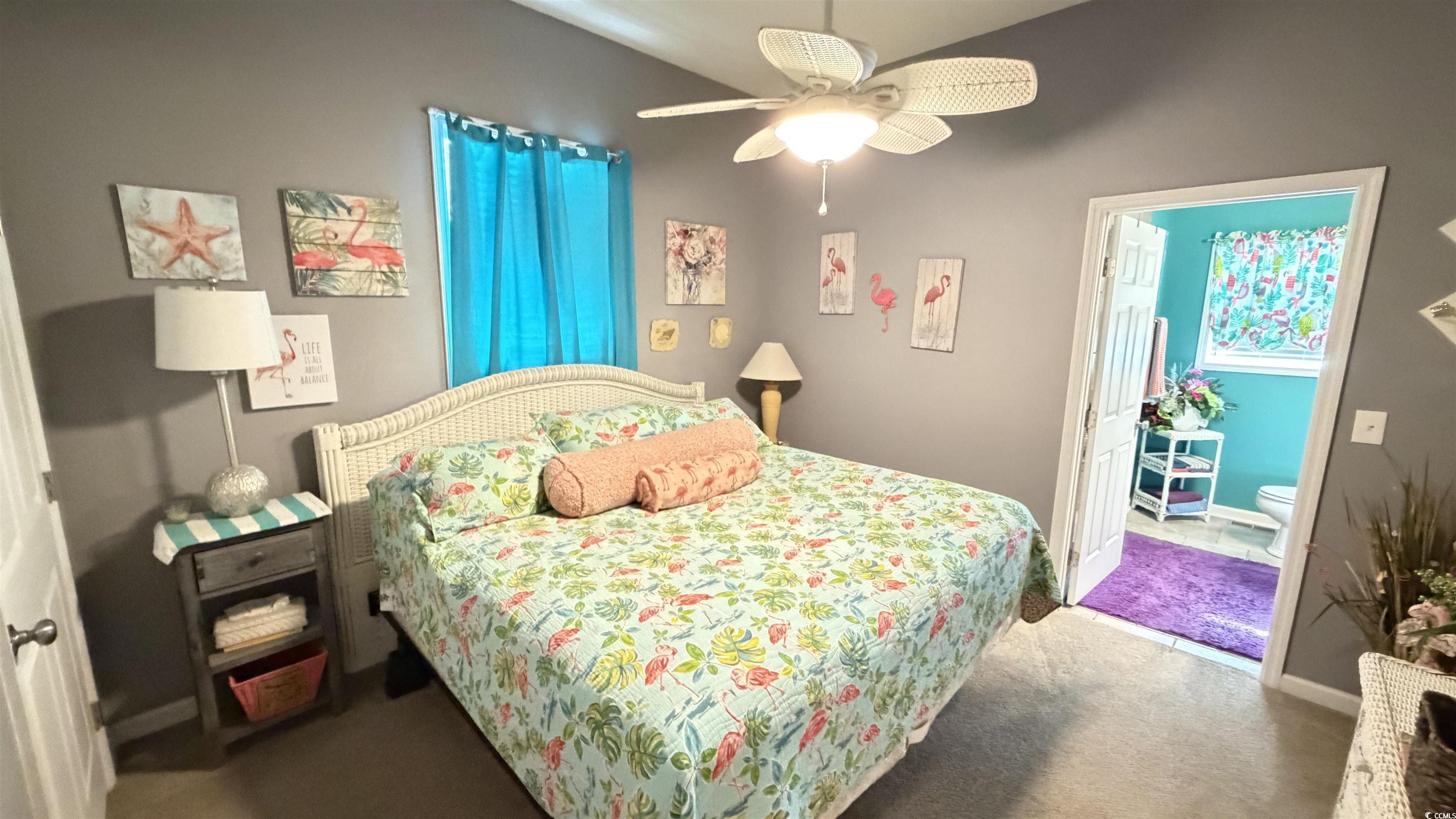 1517 Pisces Lane Myrtle Beach, SC 29575 - Photo 11 of 30 Bedroom featuring carpet floors and a ceiling fan