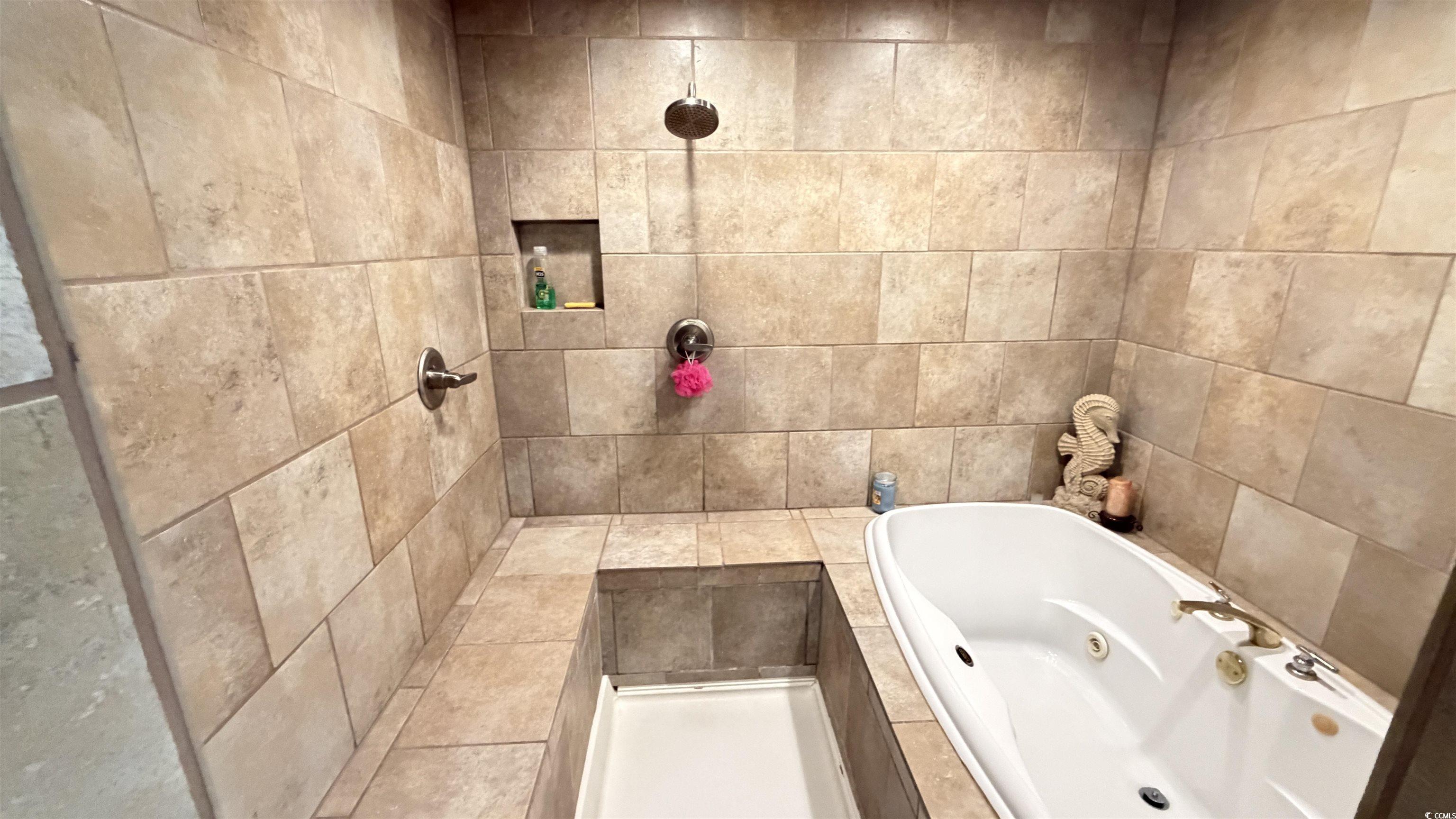 1517 Pisces Lane Myrtle Beach, SC 29575 - Photo 13 of 30 Full bathroom featuring a tub with jets and tiled shower