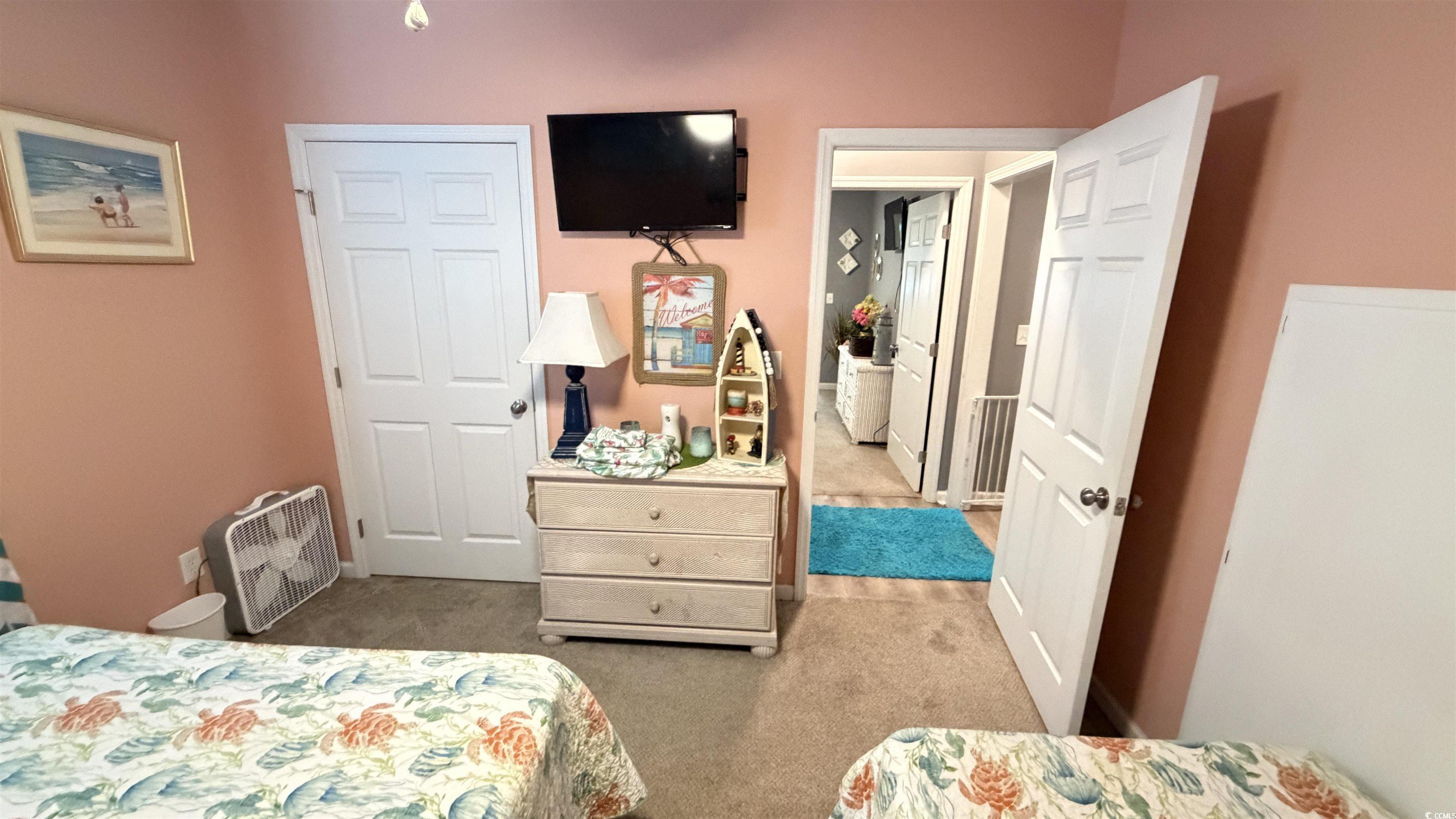1517 Pisces Lane Myrtle Beach, SC 29575 - Photo 15 of 30 Bedroom with light colored carpet