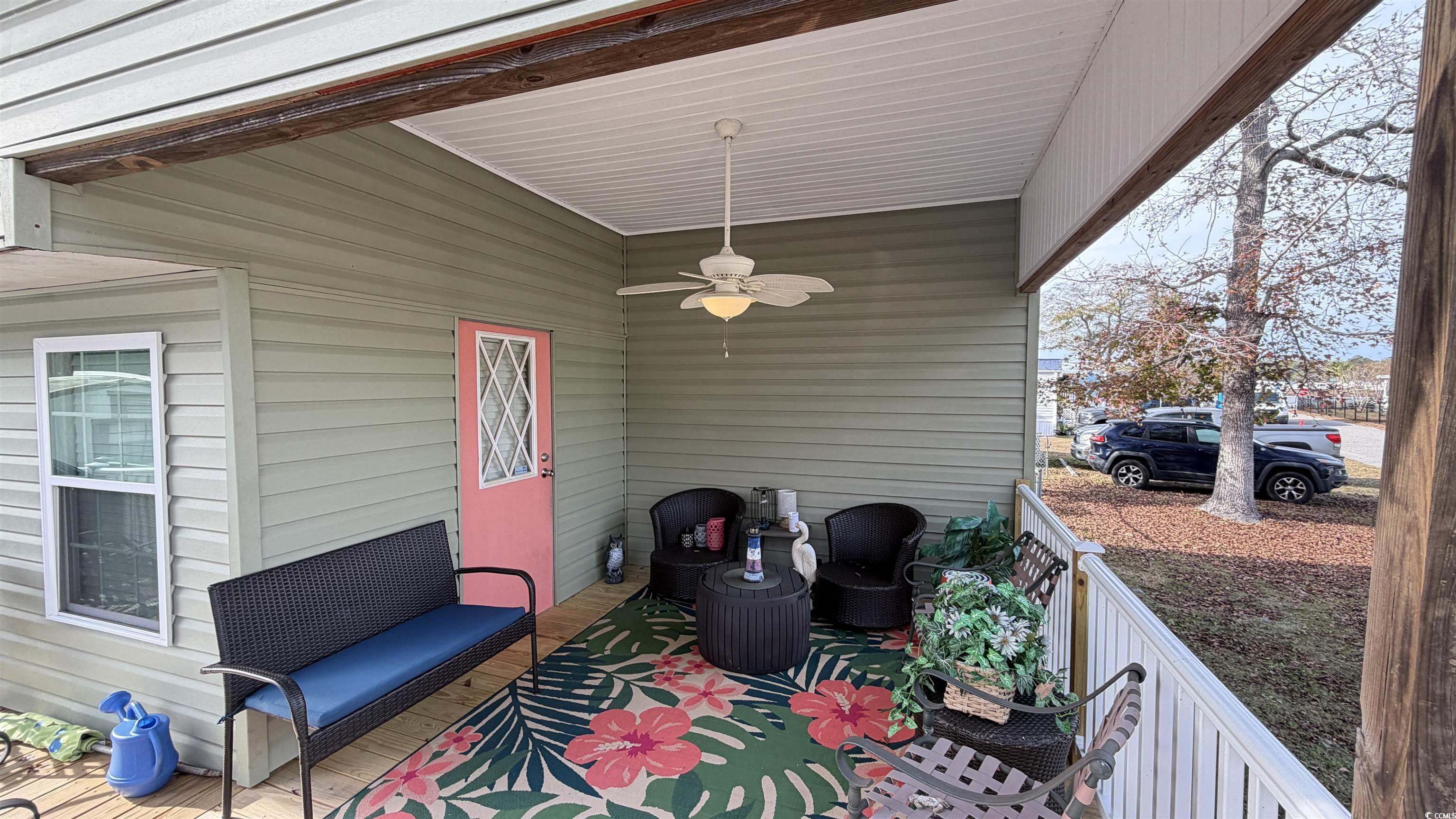1517 Pisces Lane Myrtle Beach, SC 29575 - Photo 25 of 30 Porch featuring ceiling fan