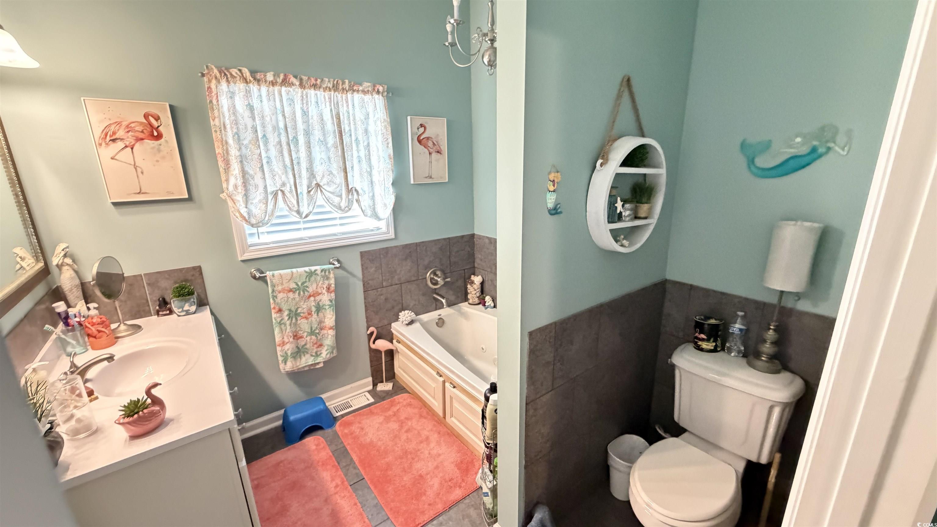 1517 Pisces Lane Myrtle Beach, SC 29575 - Photo 9 of 30 Full bath featuring vanity and a garden tub