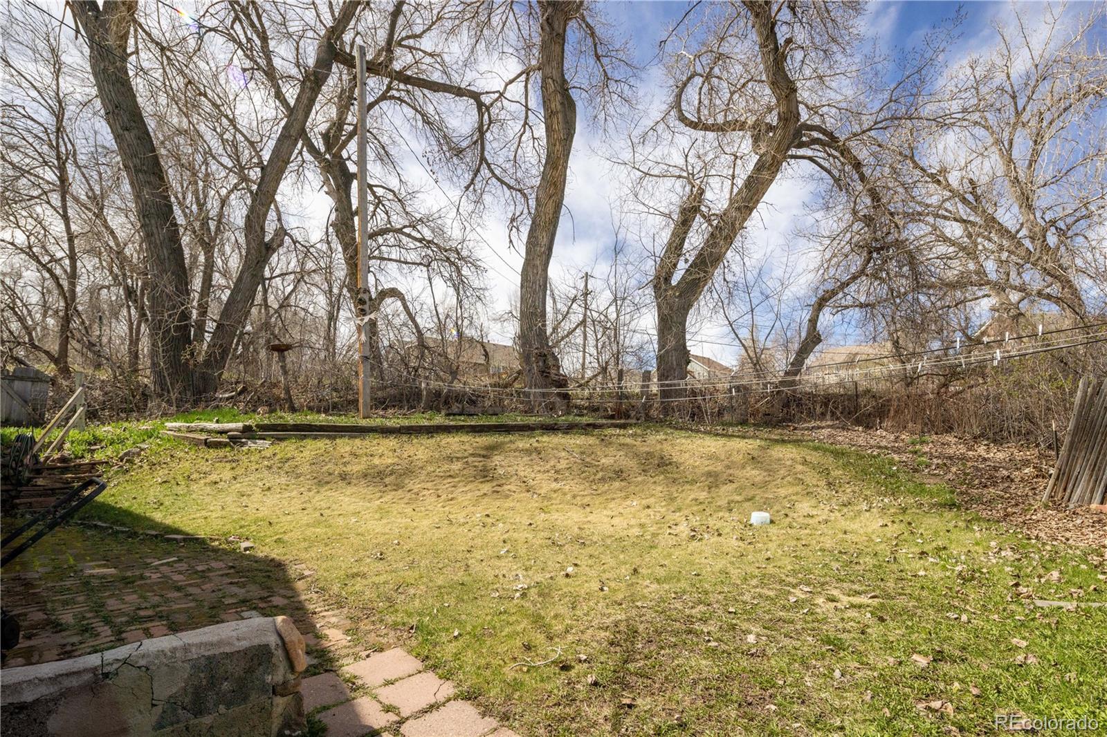 3413 Wadsworth Boulevard Wheat Ridge, CO 80033 - Photo 14 of 25 a view of yard with swimming pool