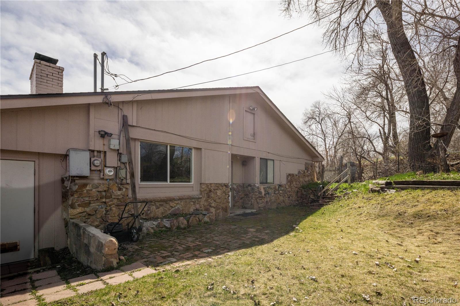 3413 Wadsworth Boulevard Wheat Ridge, CO 80033 - Photo 15 of 25 a view of house with outdoor space