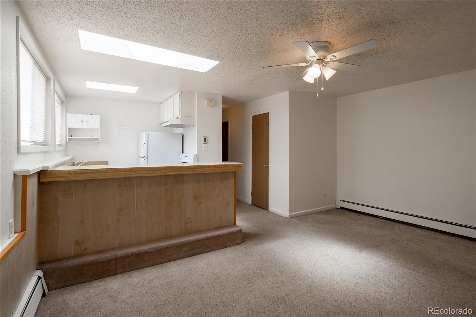 3413 Wadsworth Boulevard Wheat Ridge, CO 80033 - Photo 17 of 25 a view of a kitchen with a sink